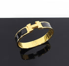 Hermes Black and Gold Clic H Narrow PM Bracelet