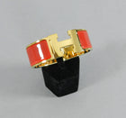 Hermes Red and Gold Clic Clac Bracelet PM