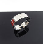 Hermes Red and Silver Clic Clack H Bangle Bracelet 