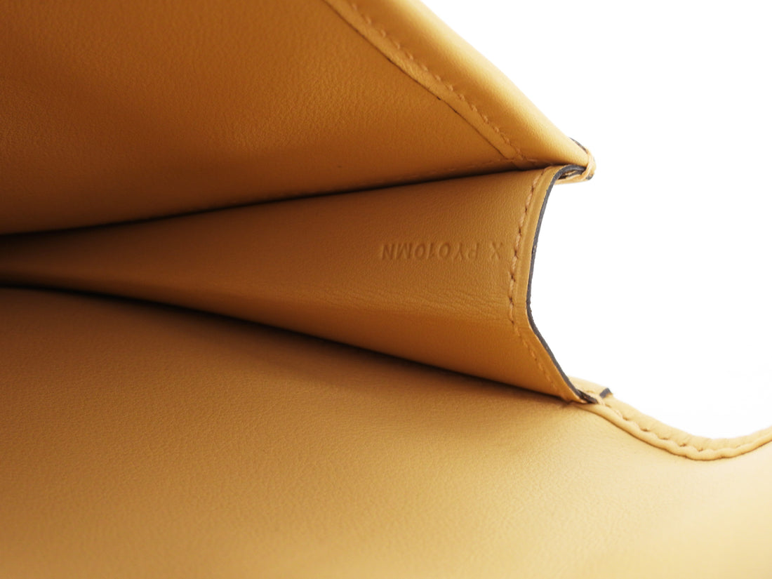 Jige leather clutch bag Hermès Orange in Leather - 35309447