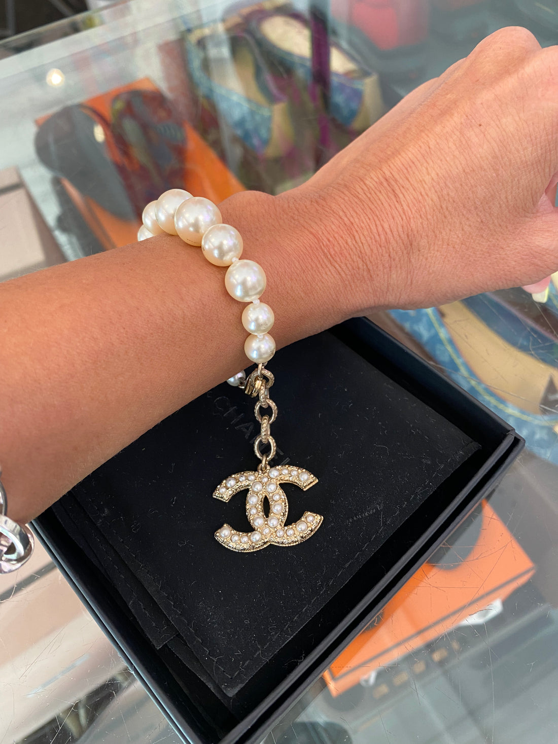 Chanel 14B Faux Pearl Graduated Bracelet With CC Charm
