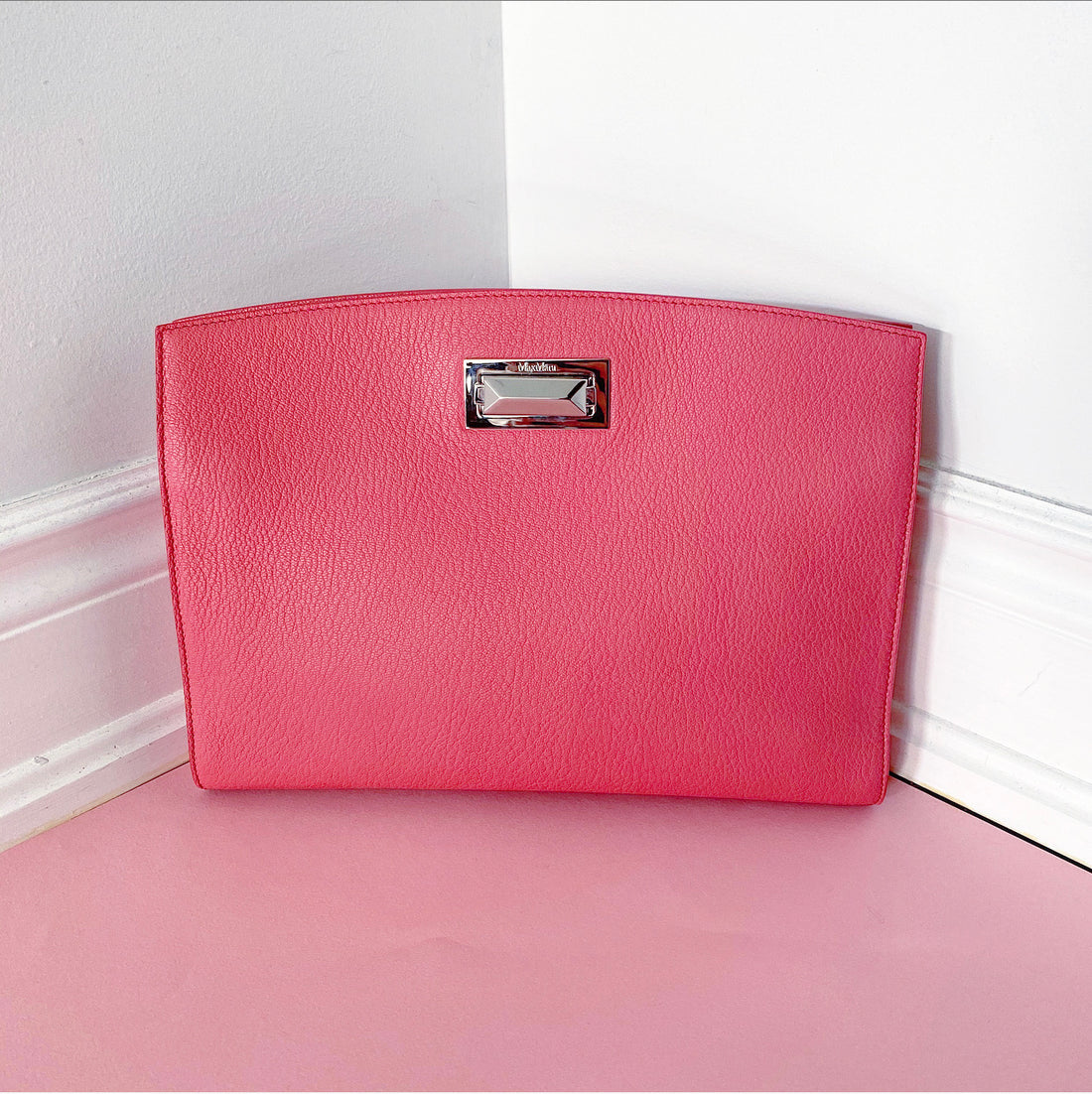 Salmon pink clutch on sale bag