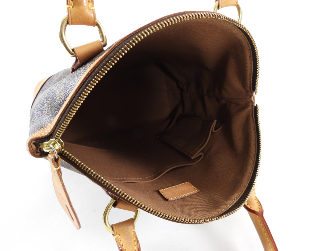 Lockit LOUIS VUITTON Handbags T. leather Brown ref.1014019 - Joli Closet