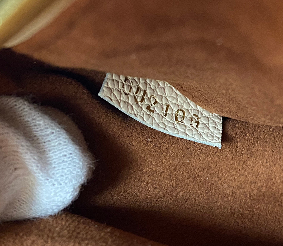 Louis Vuitton Pochette Metis Empreinte Monogram Crossbody Bag