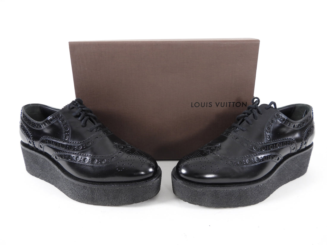 Louis Vuitton Black Oxford Platform Shoes.  Black smooth leather oxfords with lace up design and rubber 2” platform sole.  Marked size 36 but runs large and fits like a USA 6.5.  Excellent pre-owned condition (worn once and cleaned).  Includes box.