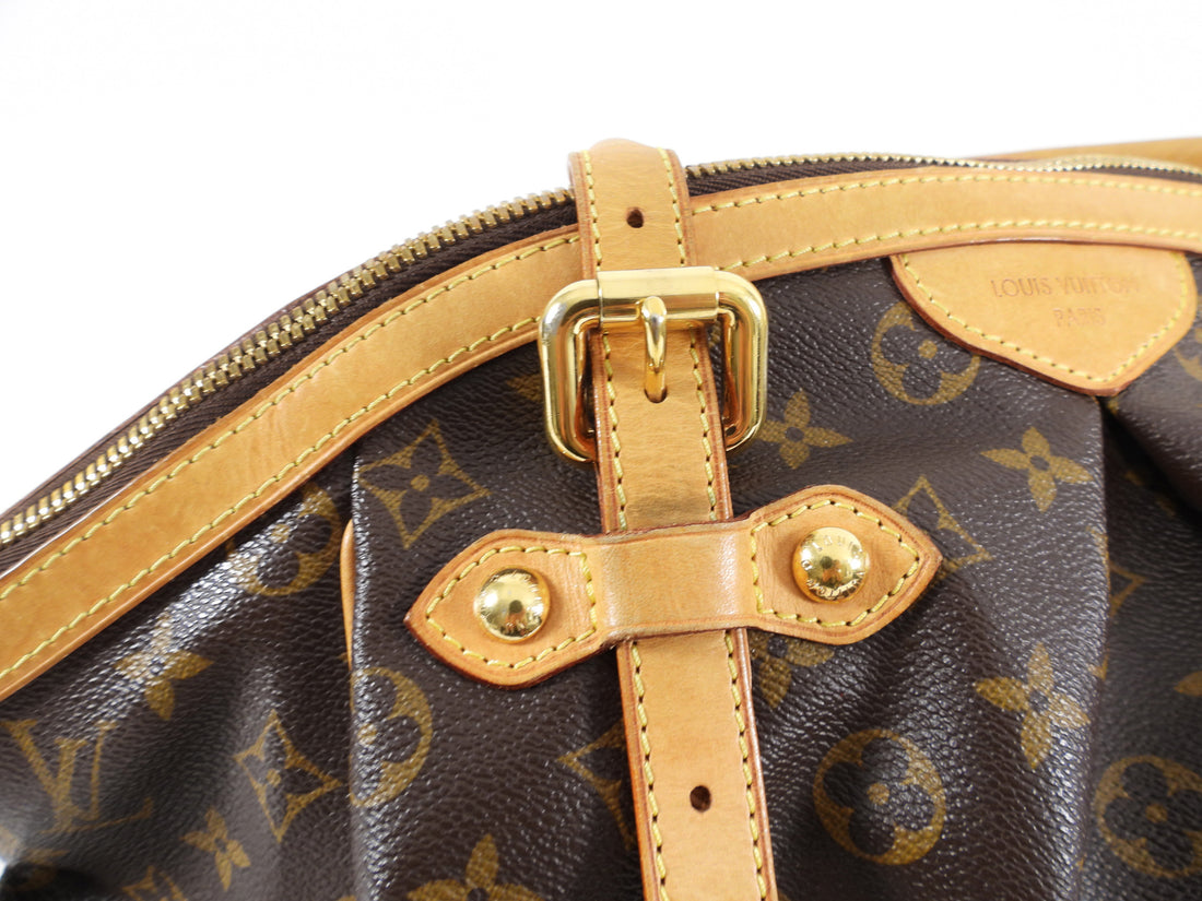 Louis Vuitton Tivoli GM. Long curved zipper allows the bag to open