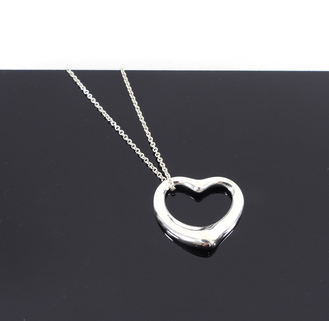 Tiffany & Co. Sterling Silver Elsa Peretti Open Heart Medium Necklace –  LuxeDH