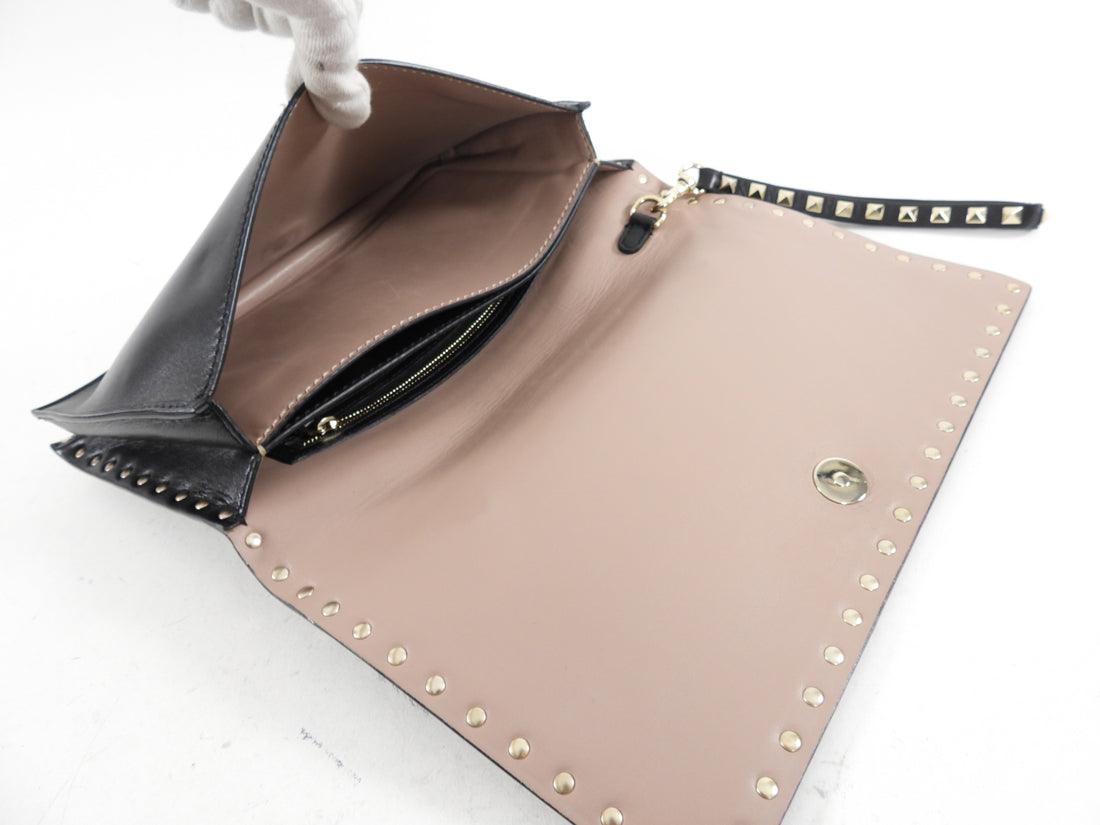 Leather clutch bag Valentino Garavani Black in Leather - 27459050